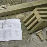 Panne charpente sur table de chantier : comprendre faîtière, sablière et ventrière